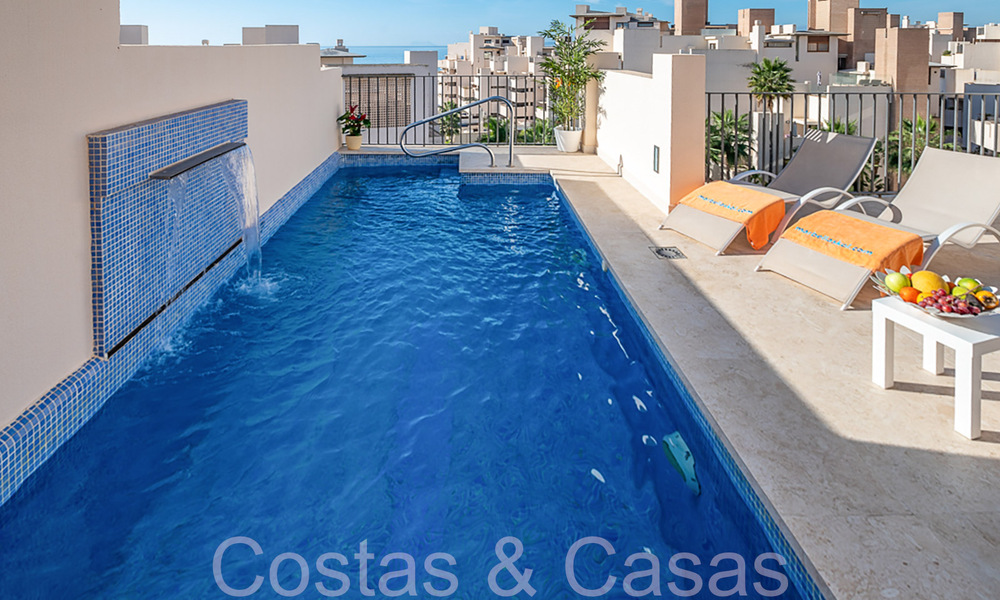 Contemporary duplex penthouse for sale in a first line beach complex with private pool between Marbella and Estepona 66587