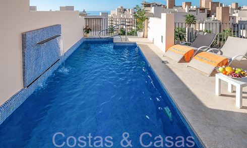 Contemporary duplex penthouse for sale in a first line beach complex with private pool between Marbella and Estepona 66587