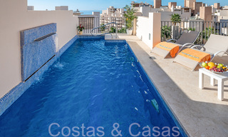 Contemporary duplex penthouse for sale in a first line beach complex with private pool between Marbella and Estepona 66587 