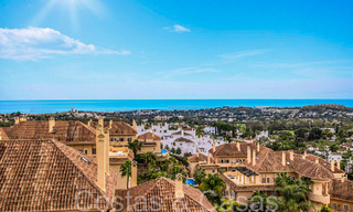Beautiful double penthouse with sea views for sale in a 5-star complex in Nueva Andalucia, Marbella 66656 