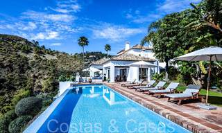 Mediterranean luxury villa for sale with golf and sea views in a gated urbanization in La Quinta, Marbella - Benahavis 66699 