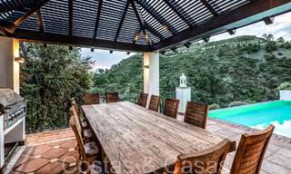 Mediterranean luxury villa for sale with golf and sea views in a gated urbanization in La Quinta, Marbella - Benahavis 66705 