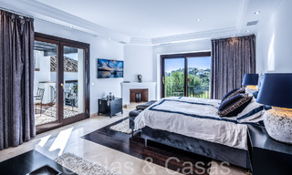 Mediterranean luxury villa for sale with golf and sea views in a gated urbanization in La Quinta, Marbella - Benahavis 66718 