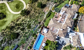 Mediterranean luxury villa for sale with golf and sea views in a gated urbanization in La Quinta, Marbella - Benahavis 66729 