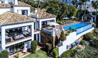 Mediterranean luxury villa for sale with golf and sea views in a gated urbanization in La Quinta, Marbella - Benahavis 66731 