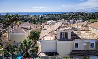 Spanish, semi-detached luxury villa with sea views for sale in the gated golf community of Santa Clara in East Marbella 67047 