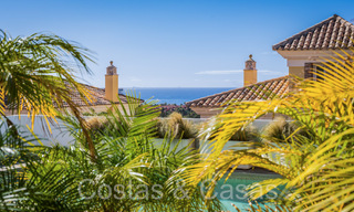 Spanish, semi-detached luxury villa with sea views for sale in the gated golf community of Santa Clara in East Marbella 67053 