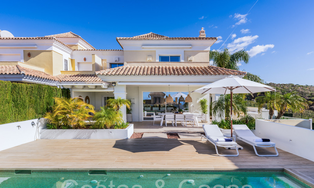 Spanish, semi-detached luxury villa with sea views for sale in the gated golf community of Santa Clara in East Marbella 67055