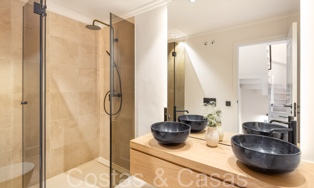 Stunning Mediterranean townhouse for sale in a highly regarded, secure urbanization on Marbella's Golden Mile 67345