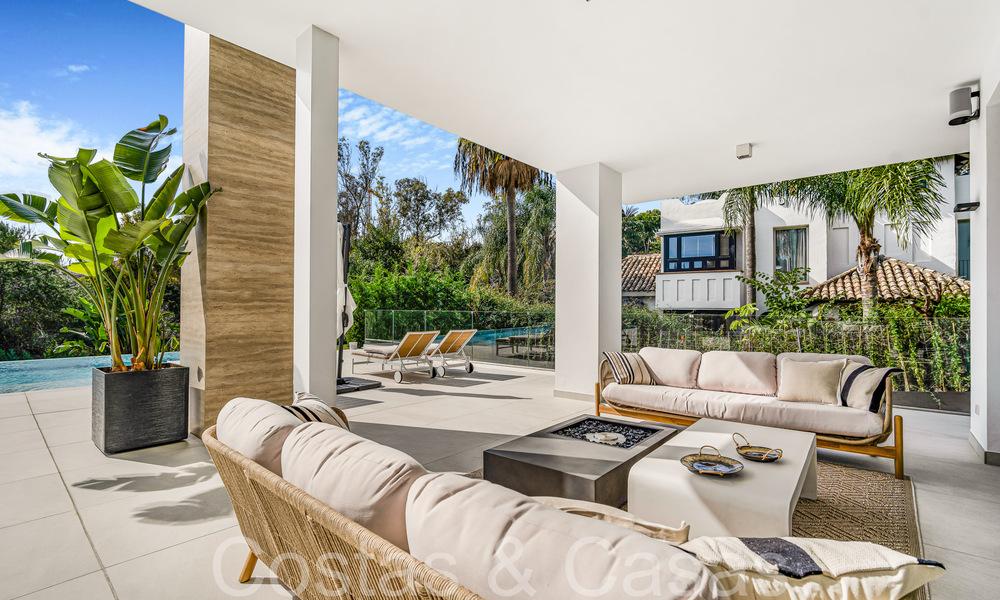 Modernist luxury villa for sale in an exclusive, gated residential area on Marbella's Golden Mile 67680