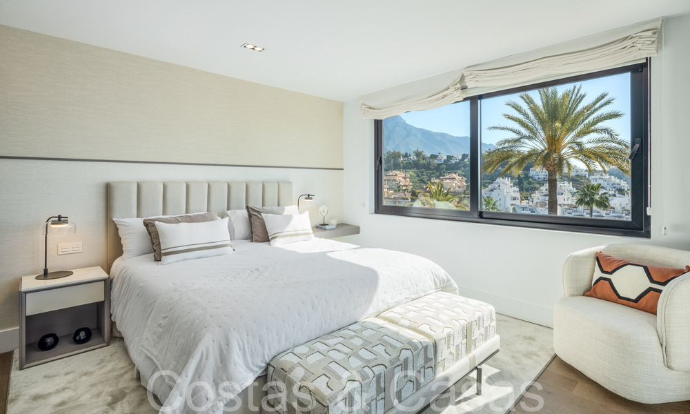 Stylishly renovated luxury villa with sea views for sale in Nueva Andalucia's golf valley, Marbella 67747