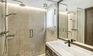 Stylishly renovated luxury villa with sea views for sale in Nueva Andalucia's golf valley, Marbella 67751 