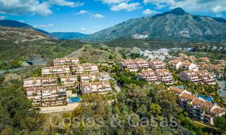 Spacious and bright duplex penthouse for sale located in Nueva Andalucia, Marbella 67978 