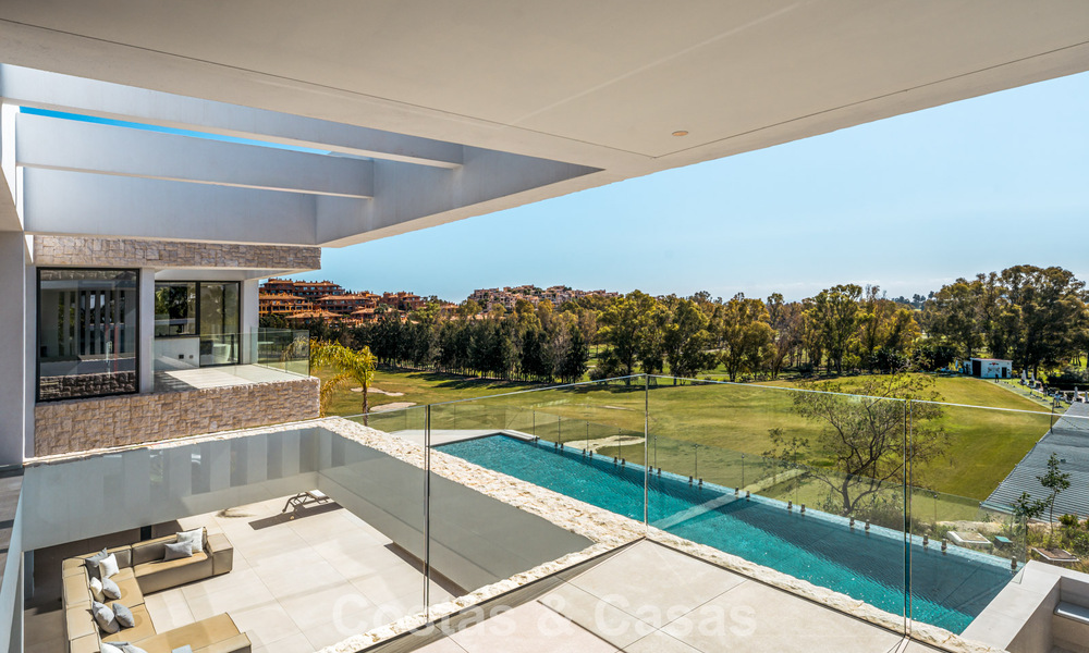 Spacious, modernist luxury villa for sale overlooking the golf course in Benahavis - Marbella 792520