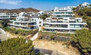 Move-in ready, modern, elegant garden apartment with private garden and sea views for sale in Marbella East 72745 