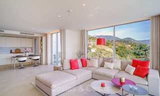 Move-in ready, contemporary apartment with sea views for sale in a gated community located in the hills of Marbella 73469 