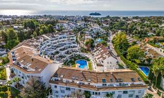 Contemporary renovated apartment within walking distance to all amenities and the beach in Nueva Andalucia, Marbella 74644 