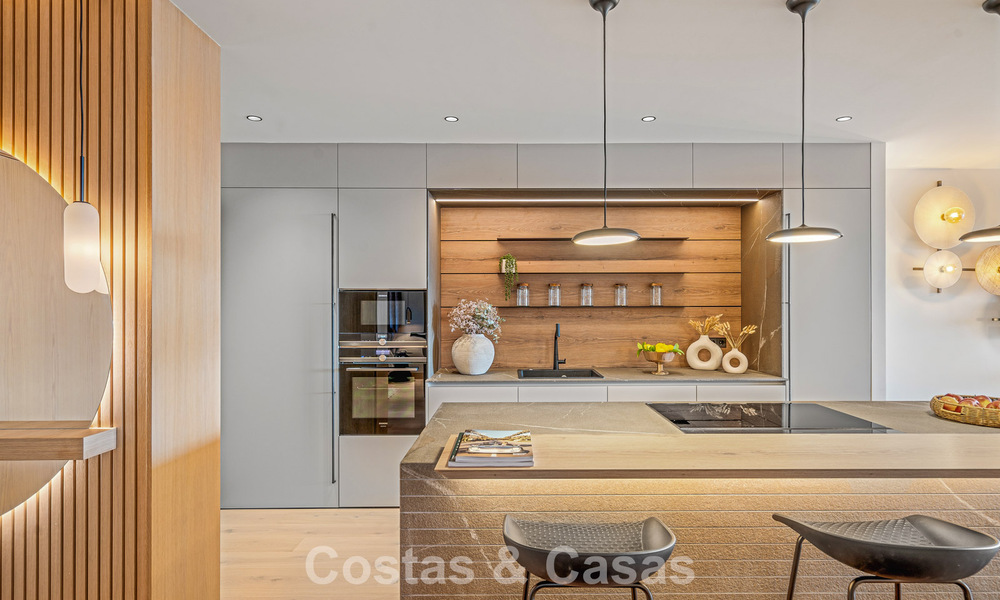 Contemporary renovated luxury apartment for sale with panoramic sea views in Nueva Andalucia’ Golf Valley, Marbella 773799