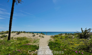 Stylish renovated apartment with sea views for sale in an exclusive beach complex in Los Monteros, Marbella East 776652 