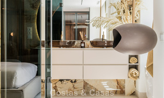Stylish renovated apartment with sea views for sale in an exclusive beach complex in Los Monteros, Marbella East 778407 