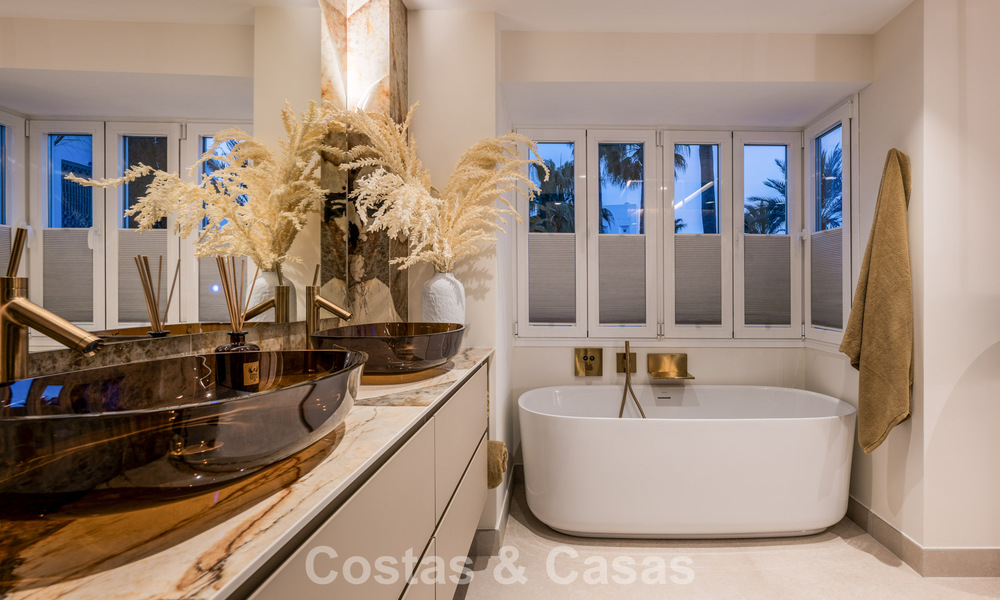Stylish renovated apartment with sea views for sale in an exclusive beach complex in Los Monteros, Marbella East 778423