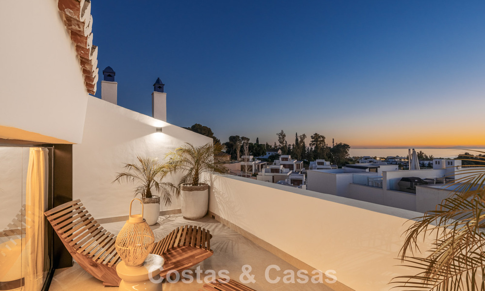 Luxurious renovated townhouse with sea views for sale, in a gated community on Marbella’s Golden Mile 775002