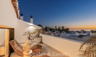 Luxurious renovated townhouse with sea views for sale, in a gated community on Marbella’s Golden Mile 775002 