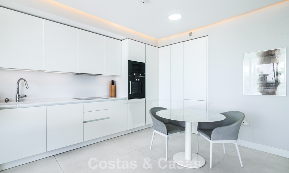 Move-in ready, modern, frontline beach apartment for sale in Estepona, Costa del Sol 775101