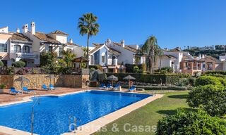 Spacious townhouse with beautiful golf and sea views for sale, in an exclusive golf urbanization in Benahavis - Marbella 775199 