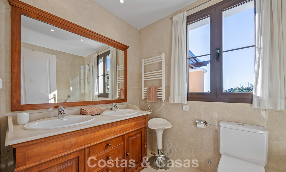 Spacious townhouse with beautiful golf and sea views for sale, in an exclusive golf urbanization in Benahavis - Marbella 775208