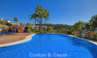 Spacious townhouse with beautiful golf and sea views for sale, in an exclusive golf urbanization in Benahavis - Marbella 775216 