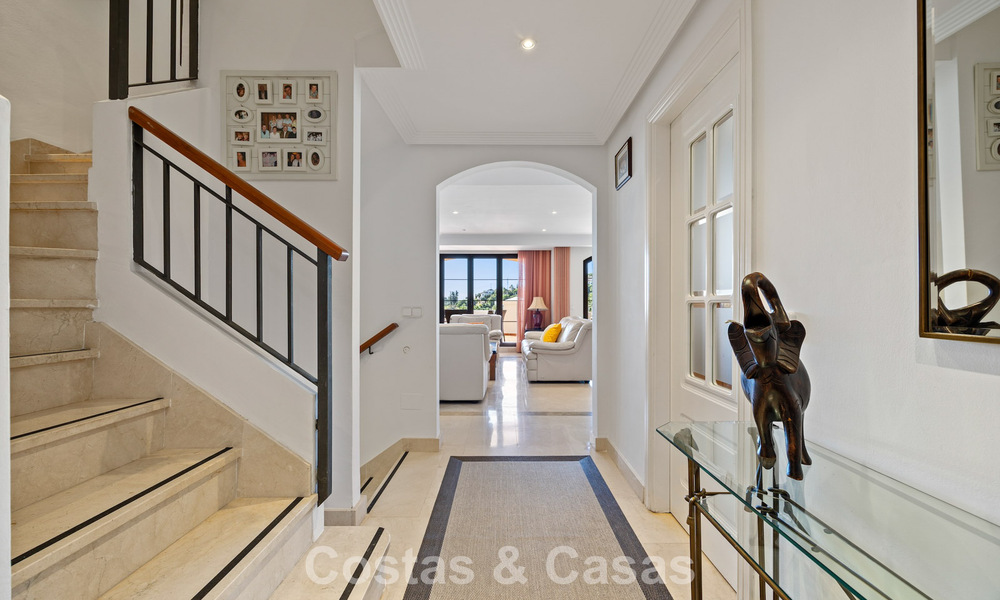 Spacious townhouse with beautiful golf and sea views for sale, in an exclusive golf urbanization in Benahavis - Marbella 775225