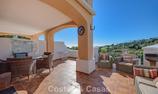Spacious townhouse with beautiful golf and sea views for sale, in an exclusive golf urbanization in Benahavis - Marbella 775228 