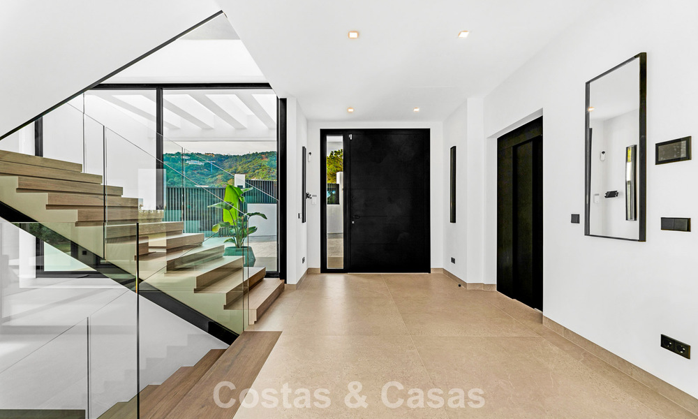 Sophisticated designer villa with magnificent sea views for sale in El Madroñal, Benahavis - Marbella 795624