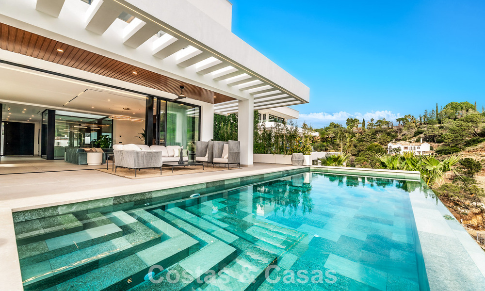 Sophisticated designer villa with magnificent sea views for sale in El Madroñal, Benahavis - Marbella 795625