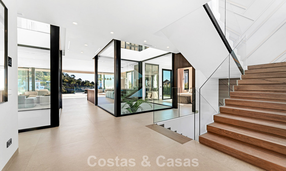 Sophisticated designer villa with magnificent sea views for sale in El Madroñal, Benahavis - Marbella 795637