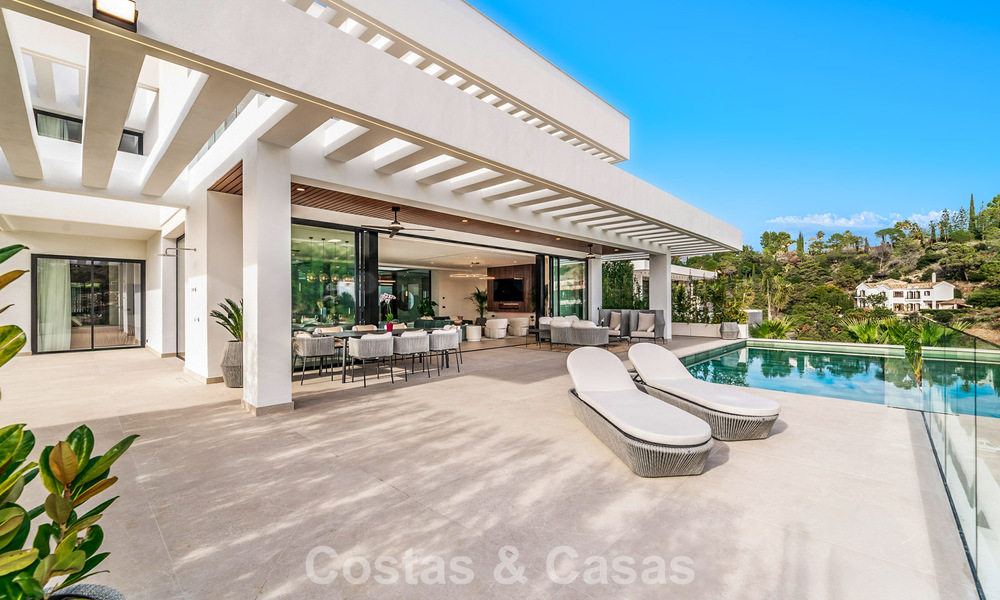 Sophisticated designer villa with magnificent sea views for sale in El Madroñal, Benahavis - Marbella 795645