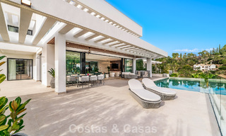 Sophisticated designer villa with magnificent sea views for sale in El Madroñal, Benahavis - Marbella 795645 