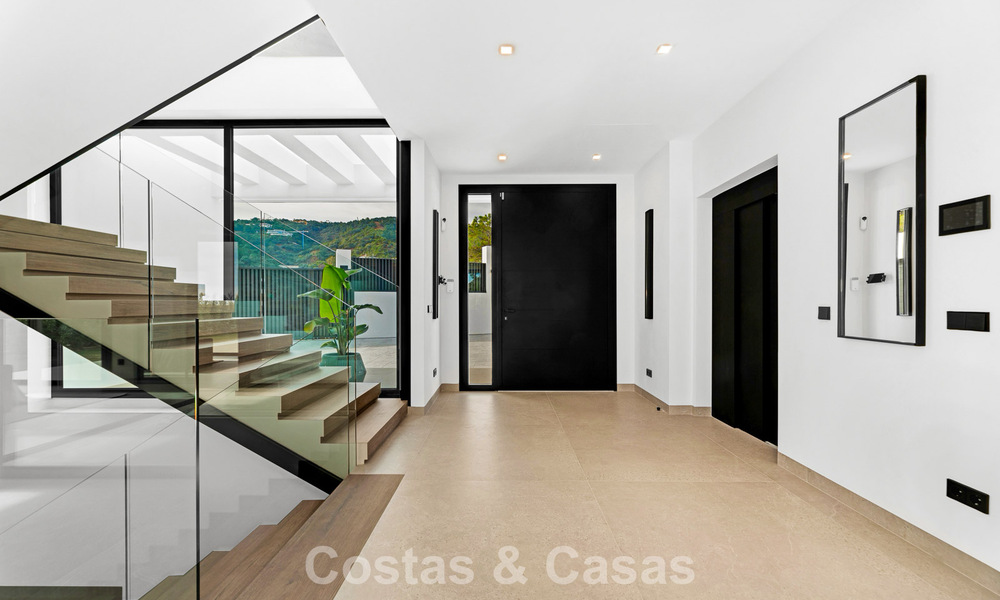 Sophisticated designer villa with stunning sea views for sale in El Madroñal, Benahavis - Marbella 796860
