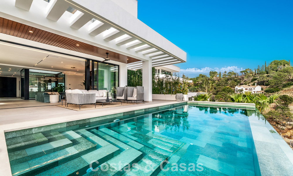 Sophisticated designer villa with stunning sea views for sale in El Madroñal, Benahavis - Marbella 796861