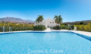 New 3 bedroom townhouses for sale in a prestigious golf resort in Mijas, Costa del Sol 775408 