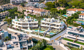 New, large designer apartments with golf and sea views in an avant-garde architectural style for sale in Marbella East 776199 