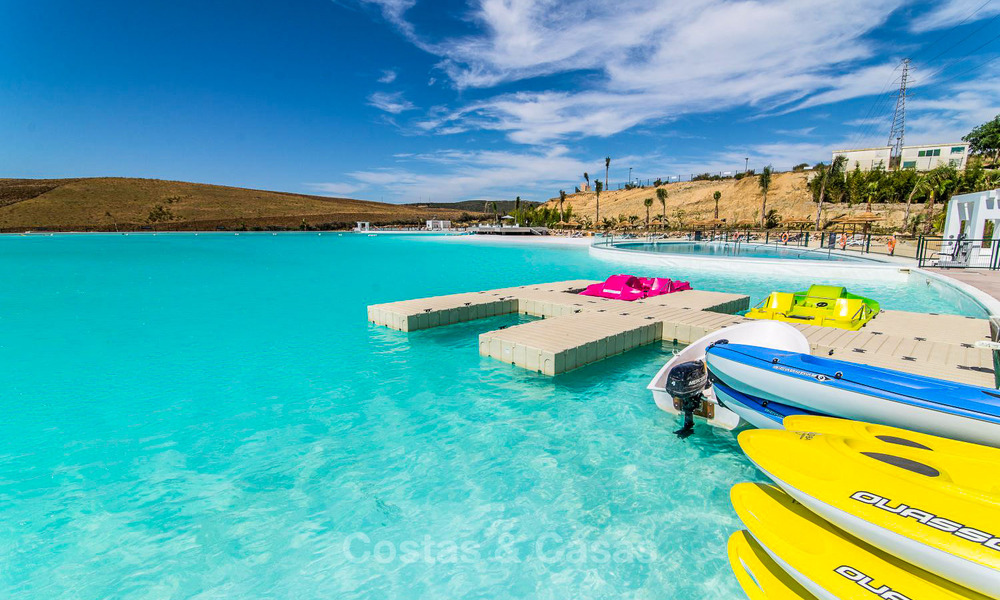 Elegant off-plan apartments for sale just a stone’s throw from a blue lagoon on the Costa del Sol 776185