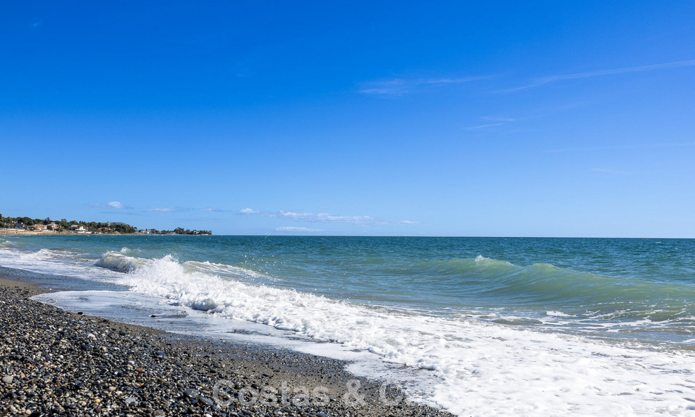 Spacious townhouse for sale in a beachfront complex on the New Golden Mile between Marbella and Estepona 776040