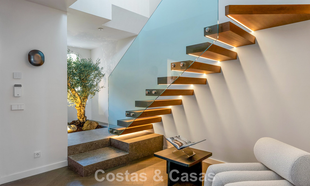 Modern renovated duplex penthouse for sale, short distance to all amenities in Nueva Andalucia’s golf valley, Marbella 793379