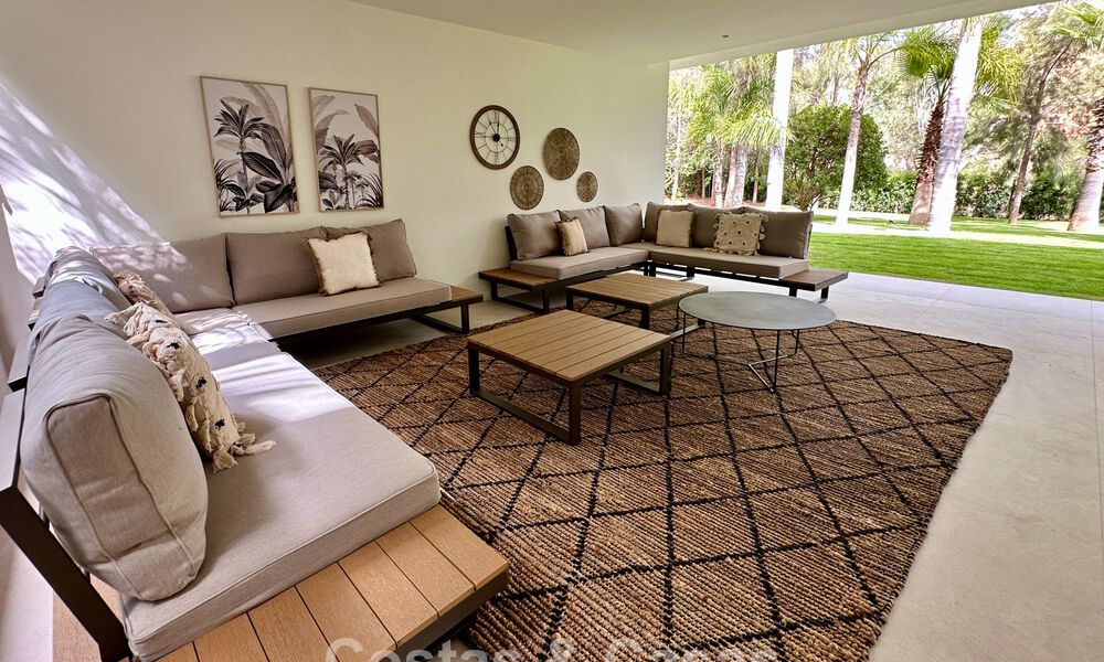 Renovated modern luxury villa for sale in a prestigious residential area in Marbella East 777031