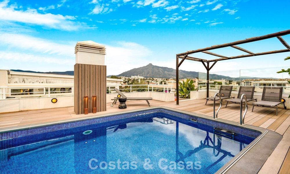 Exclusive, spacious duplex penthouse for sale, with private pool and sea view, close to the beach in Puerto Banus, Marbella 777022