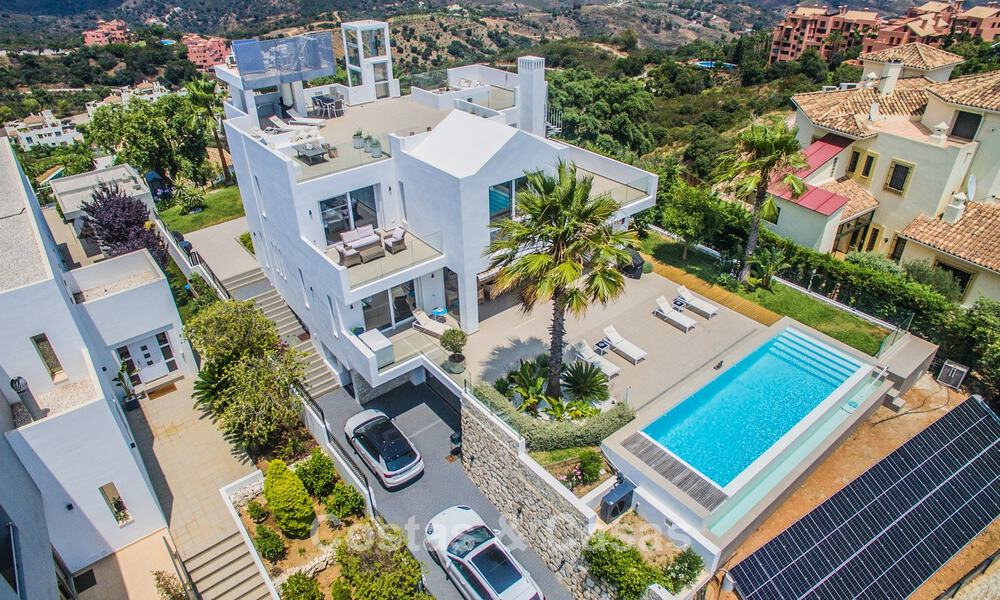 Contemporary Mediterranean luxury villa with panoramic mountain and sea views for sale in East Marbella 776847