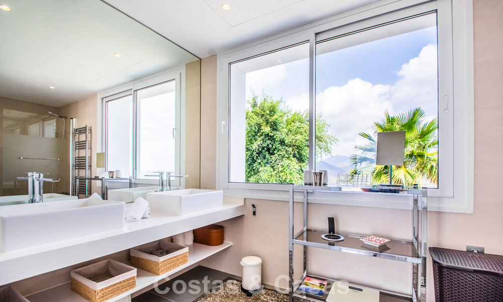 Contemporary Mediterranean luxury villa with panoramic mountain and sea views for sale in East Marbella 776848