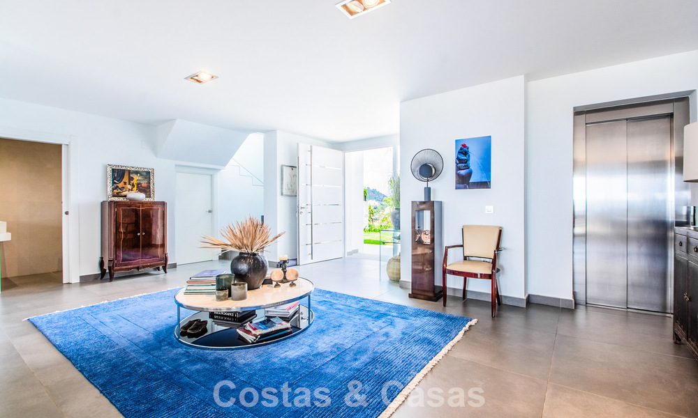 Contemporary Mediterranean luxury villa with panoramic mountain and sea views for sale in East Marbella 776882